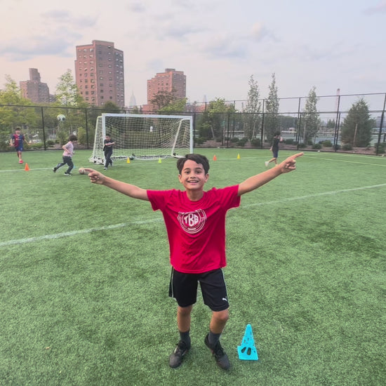 Kids having fun at Tirana Football Club soccer practice in East River Park New York